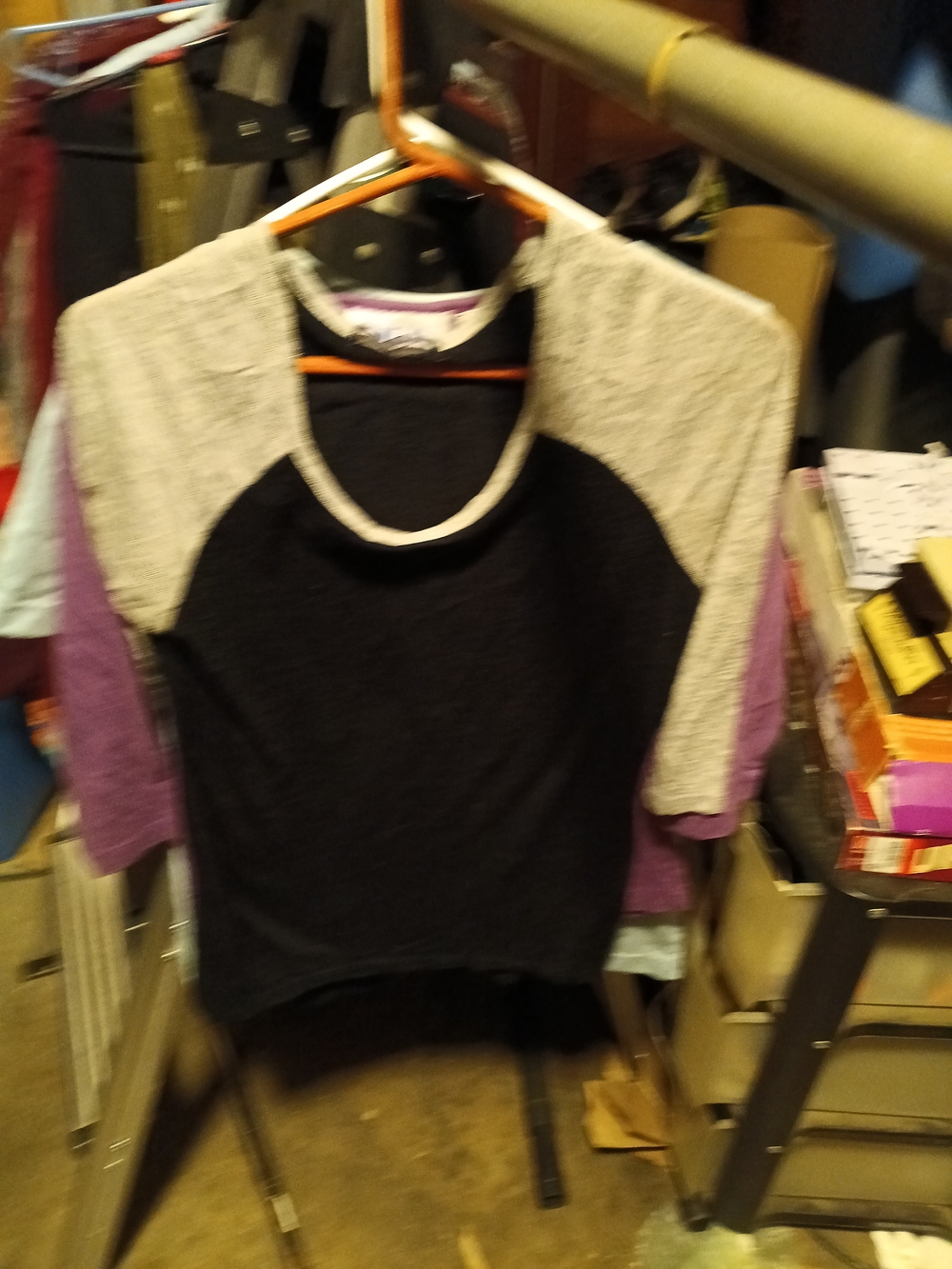 happening in the present Black, Cream and Purple Raglan Tee